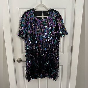 Fun large sequin dress.